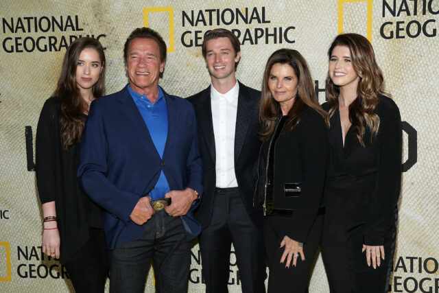 The couple and their grown children at a National Geographic' event