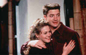 Alicia Silverstone and Brendan Fraser hugging in a scene from 'Blast from the Past'