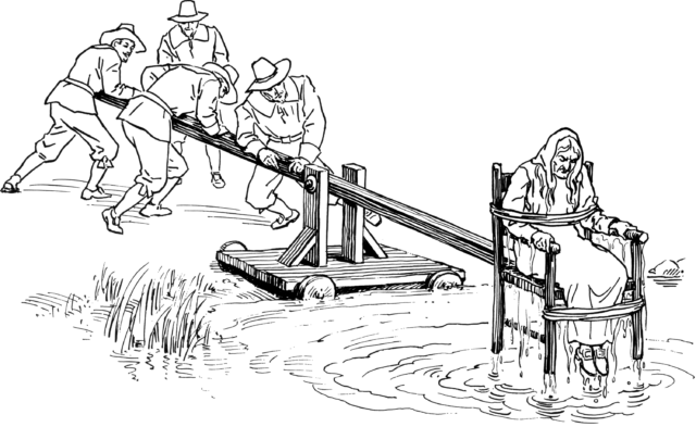 An illustration of a woman being ducked on a ducking stool. Men dropping her down into water on the other end.