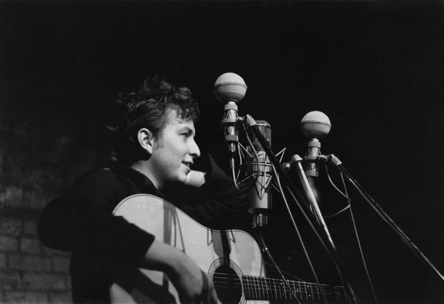 Bob Dylan performing on stage