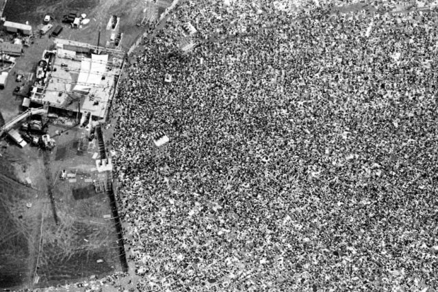 Aerial view looking down at the crowds at Woodstock.