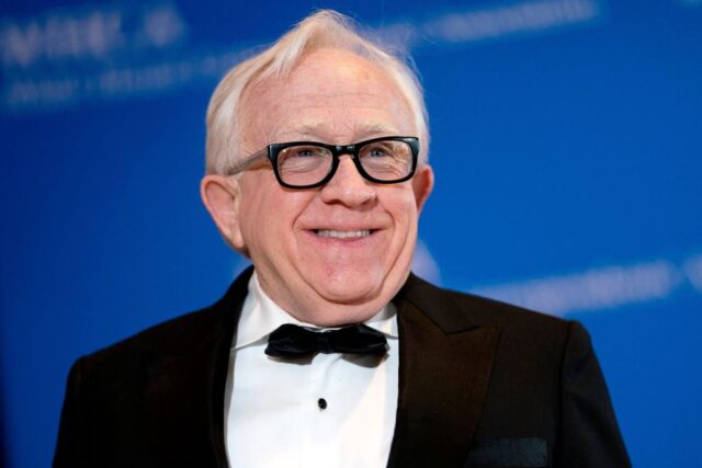 Leslie Jordan in a black suit with a bow tie.
