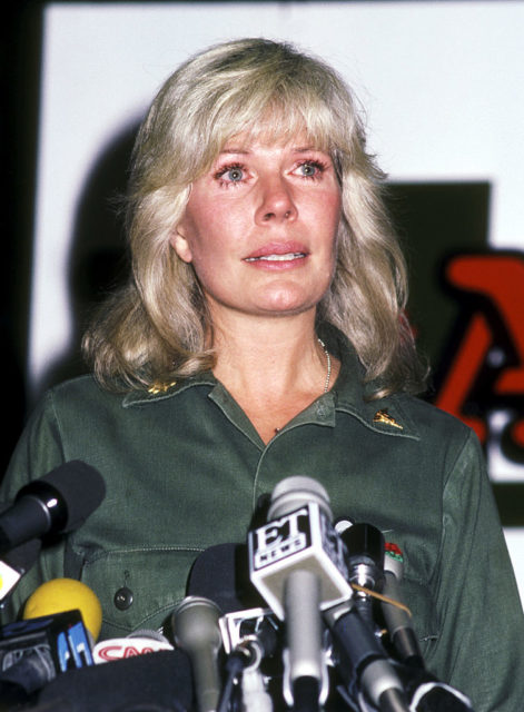Loretta Swift crying during a press conference. 