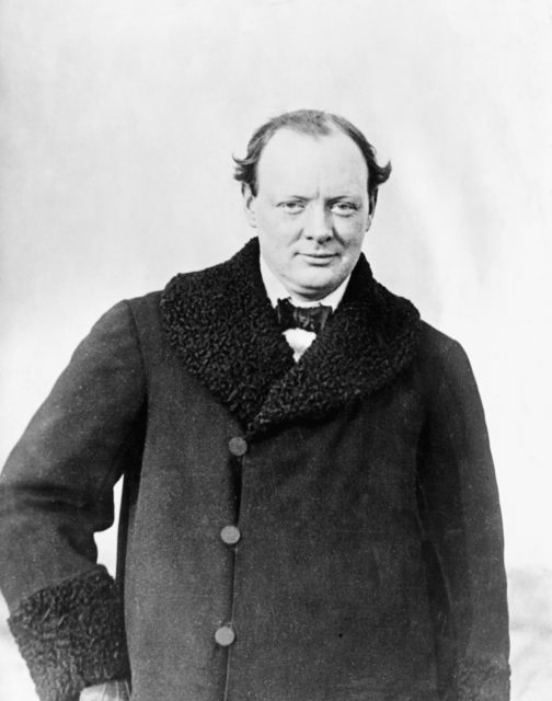 Photo of Winston Churchill ca. 1908-1909. He is wearing a winter coat and no hat