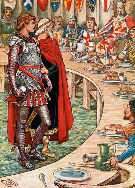 Drawing of Sir Lancelot in armor and Merlin in a red cloak standing in front of Knights sitting at a round table and King Arthur.