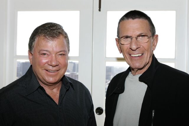 Headshot of William Shatner and Leonard Nimoy smiling for a photo.