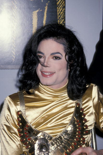 Michael Jackson is pictured receiving the Humanitarian of the Year Award