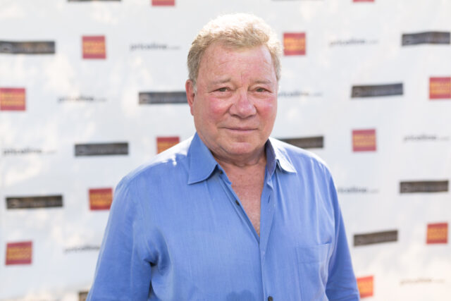 Shatner in a blue shirt at a Hollywood Charity Horse Show 