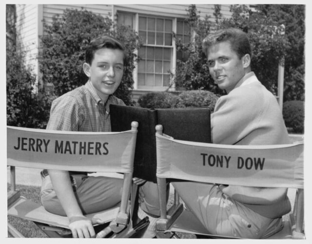 Jerry Mathers and Tony Dow sitting in directors chairs with their names on the back.