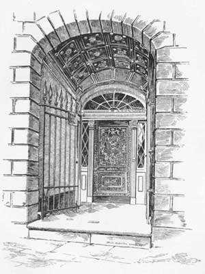 Line drawing of the entrance to the LaLaurie Mansion set into brick with small windows on either side of the wooden door.