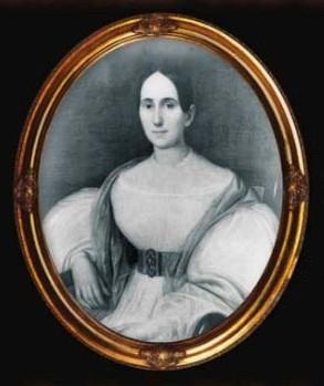 Portrait of Delphine LaLaurie in a white dress with large puffed sleeves.