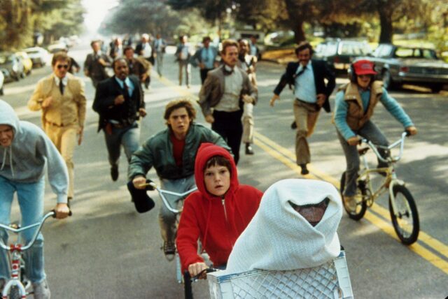 Elliot and E.T. are chased by federal agents in a still from E.T. the Extra-Terrestrial 