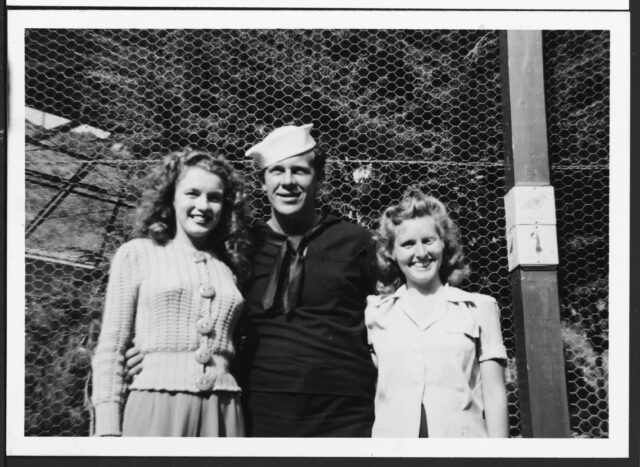 A photograph of Norma Jeane Mortenson, James Dougherty, and another woman.