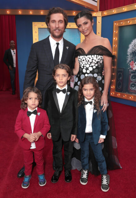 Matthew McConaughey, Camila Alves and their three children posing on a red carpet