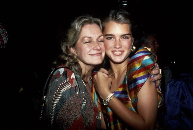 Teri Shields hugging Brooke Shields from the side.