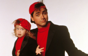 John Stamos with one of the Olsen twins