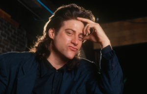 Richard Lewis in his trademark black shirt during a stand up show