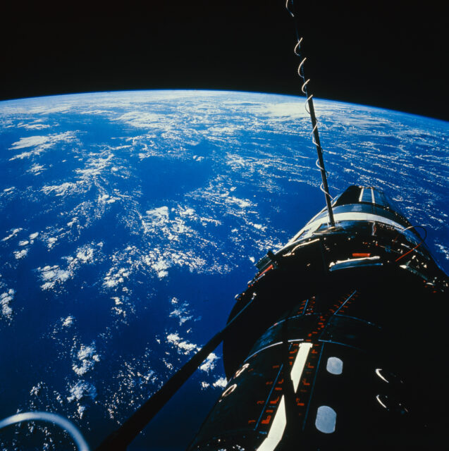 Apollo 9 Command/ service Module and Lunar "Spider" docked with Earth in the background