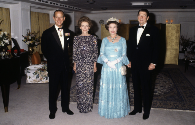 The Queen and Prince Philip pose with President Ronald Reagan and First Lady Nancy Reagan aboard HMY Britannia.