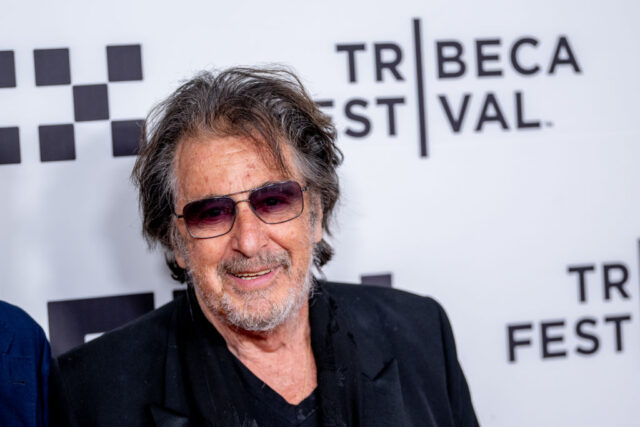 Al Pacino standing on a red carpet