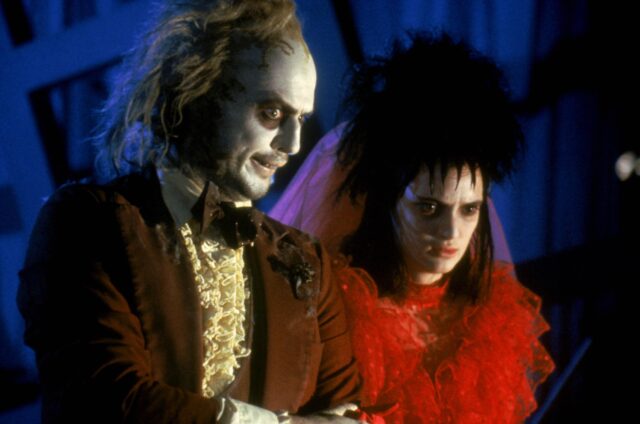 Michael Keaton as Beetlejuice and Winona Ryder as Lydia Deetz