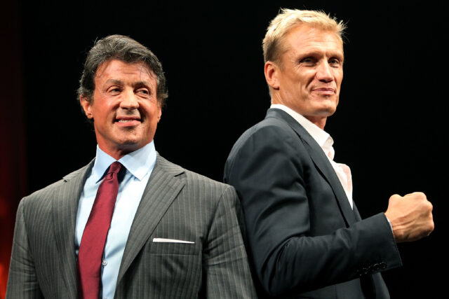 Sylvester Stallone (L) and actor Dolph Lundgren pose during the premiere of 'The Expendables' in Japan