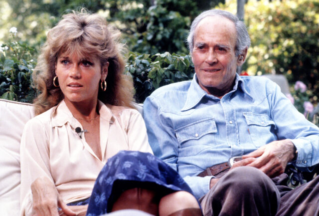 Jane and Henry Fonda sitting beside each other.