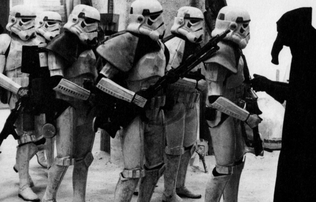Garindan notifies Imperial Desert stormtroopers about the missing droids and the Millennium Falcon. 