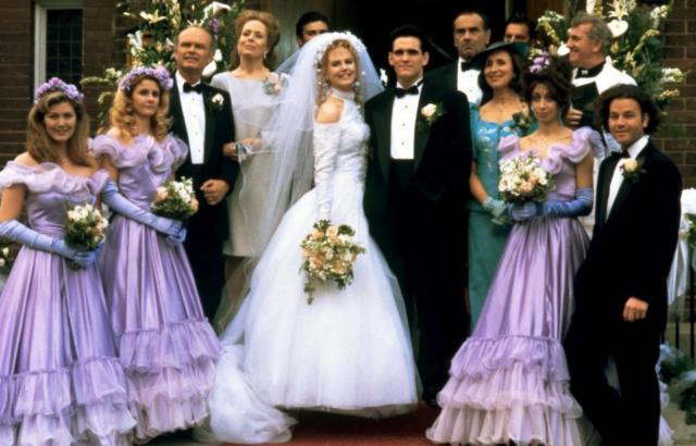 Nicole Kidman, Matt Dillon, and others at the wedding of Suzanne Stone and Larry Maretto in To Die For. 