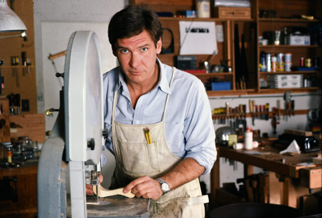 Harrison Ford standing at a wood-working station