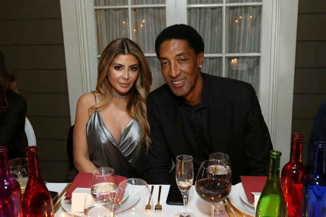 Scottie Pippen and Larsa Pippen sitting at a dinner table.