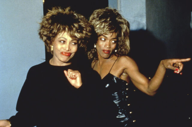 Angela Bassett and Tina Turner looking to the right together.