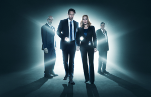 David Duchovny, Gillian Anderson, Mitch Pileggi, and William B. Davis in a promotional still for the X-Files season 10.