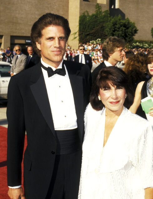 Ted Danson and Cassandra Coates on a red carpet.