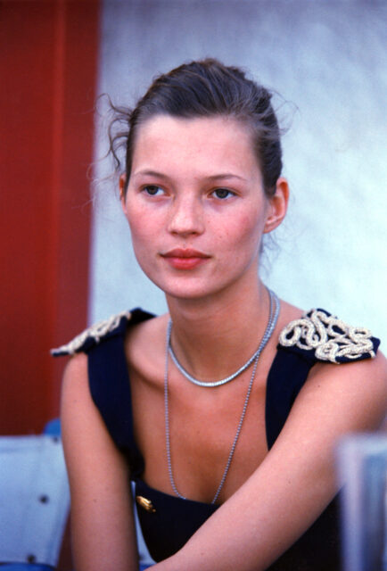Headshot of Kate Moss looking off into the distance.