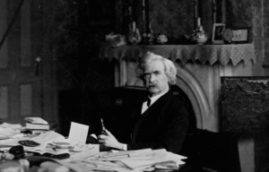 Mark Twain at his writing desk