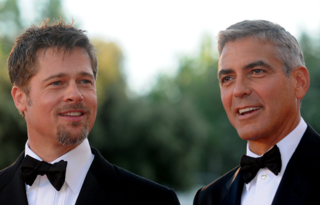 Brad Pitt, left, and George Clooney at the opening ceremony and Burn After Reading Premiere at the 65th Venice FIlm Festival in Venice, Italy, on August 27, 2008.