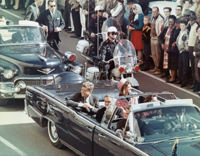 John Connally riding in the Presidential Motorcade with Jacqueline and John F. Kennedy