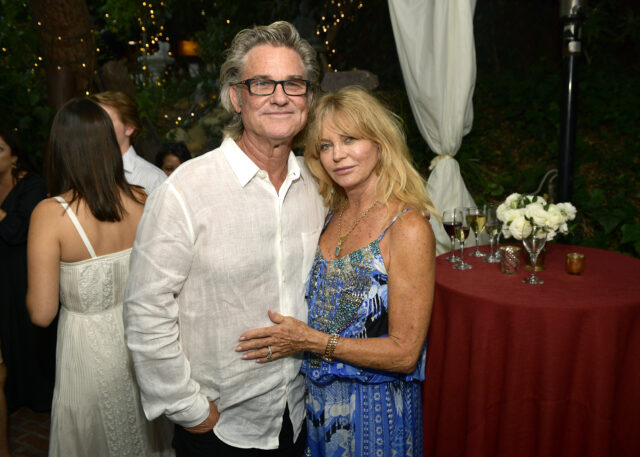 Goldie Hawn and Kurt Russell posing for a photo. 