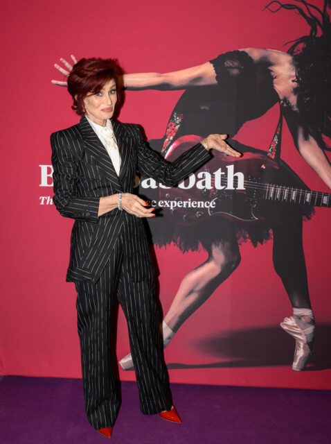 Sharon Osbourne posing on a red carpet.