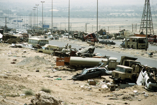 Burned-out vehicles along the Highway of Death
