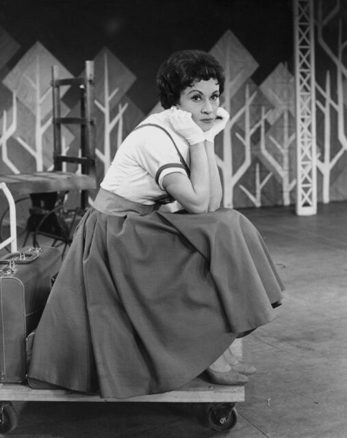 Chita Rivera sitting with her chin in her hands