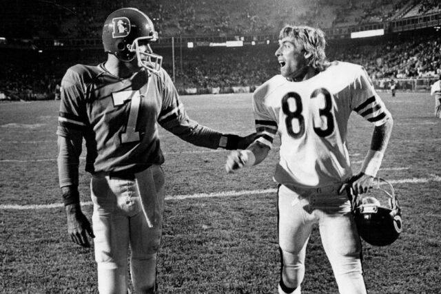 Craig Morton and Golden Richards standing on a football pitch