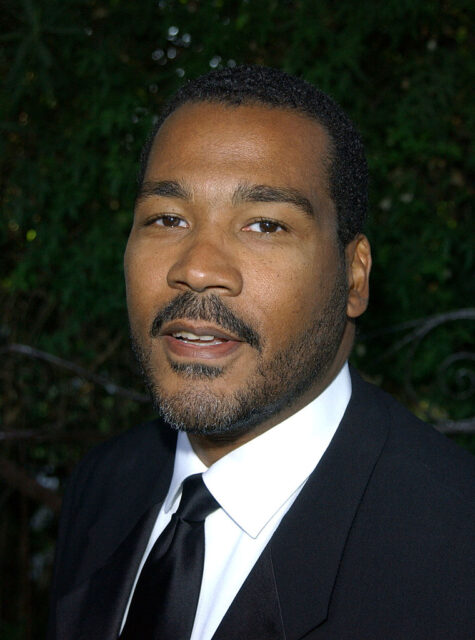 Dexter Scott King standing on a red carpet