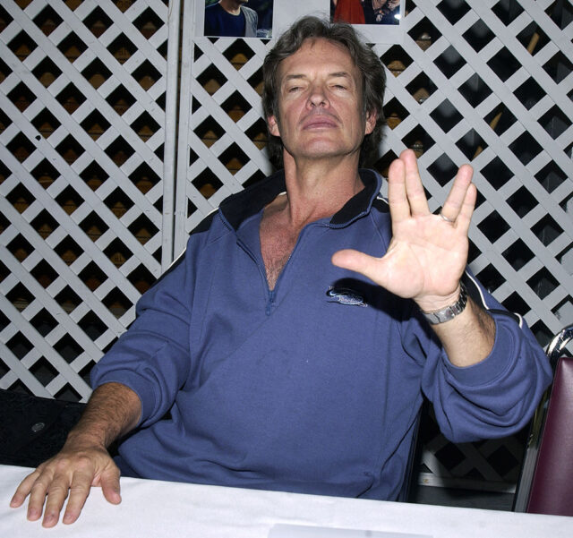 Gary Graham holding up the "live long and prosper" symbol from 'Star Trek'