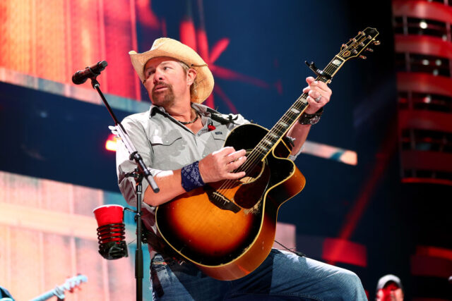 Toby Keith performing on stage