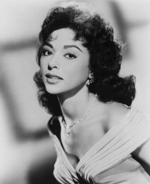 Headshot of Rita Moreno.