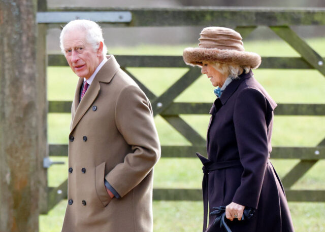 King Charles III and Camilla, Queen Consort walking outside