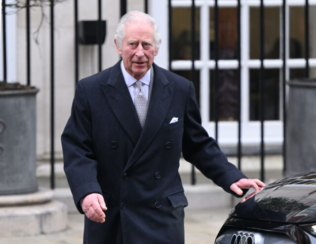 King Charles III standing outside the London Clinic