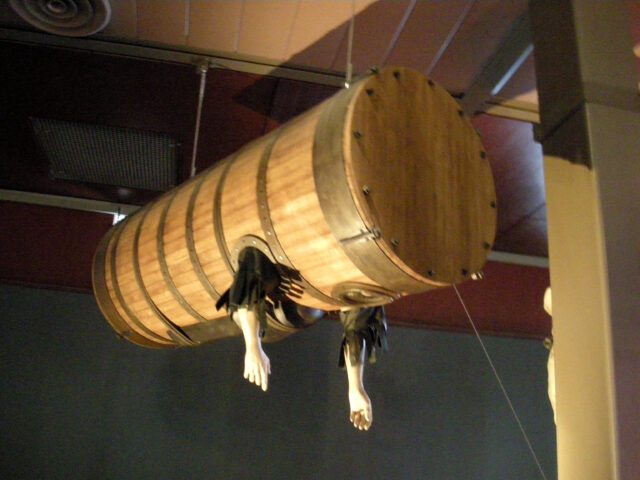 A replica of diving machine hung up.